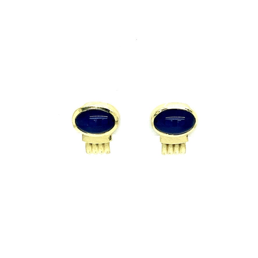14 kt gold stud earrings with star sapphire