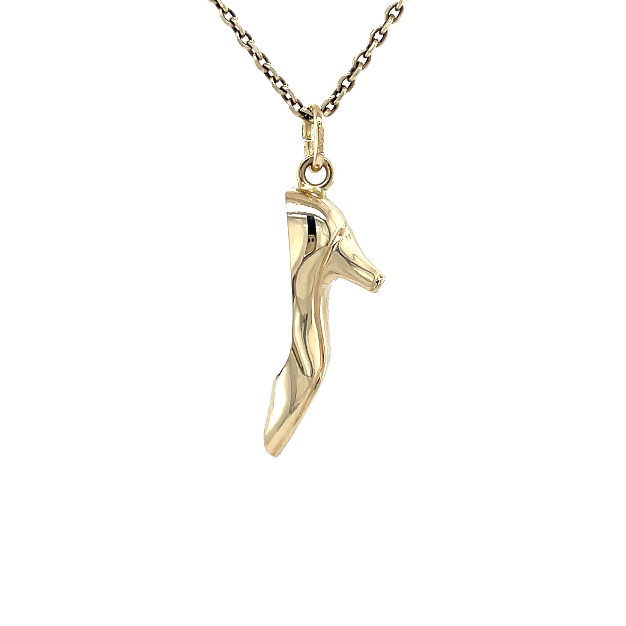 14 kt gold vintage heel pendant