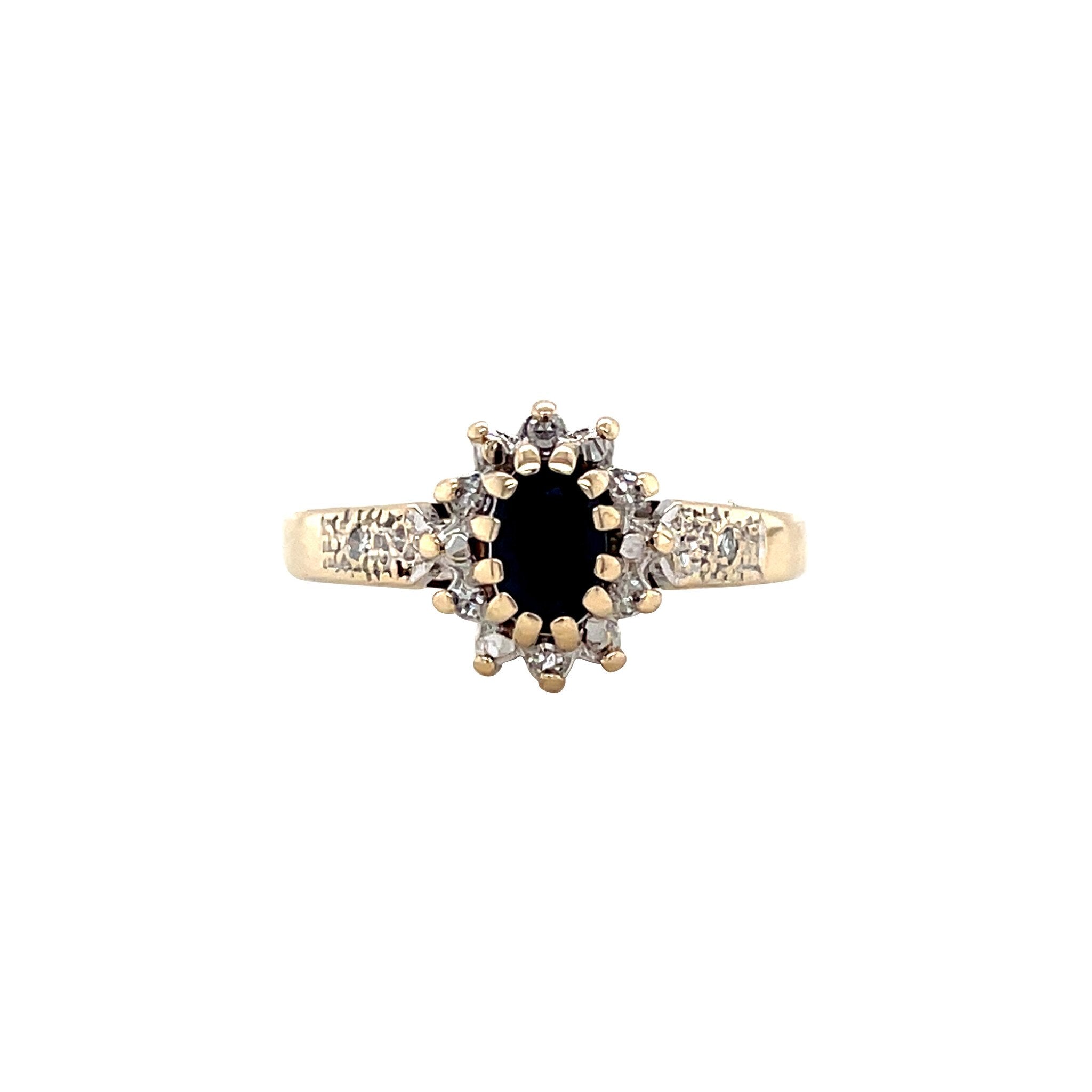 Vintage halo ring with sapphire and diamond, 9 kt