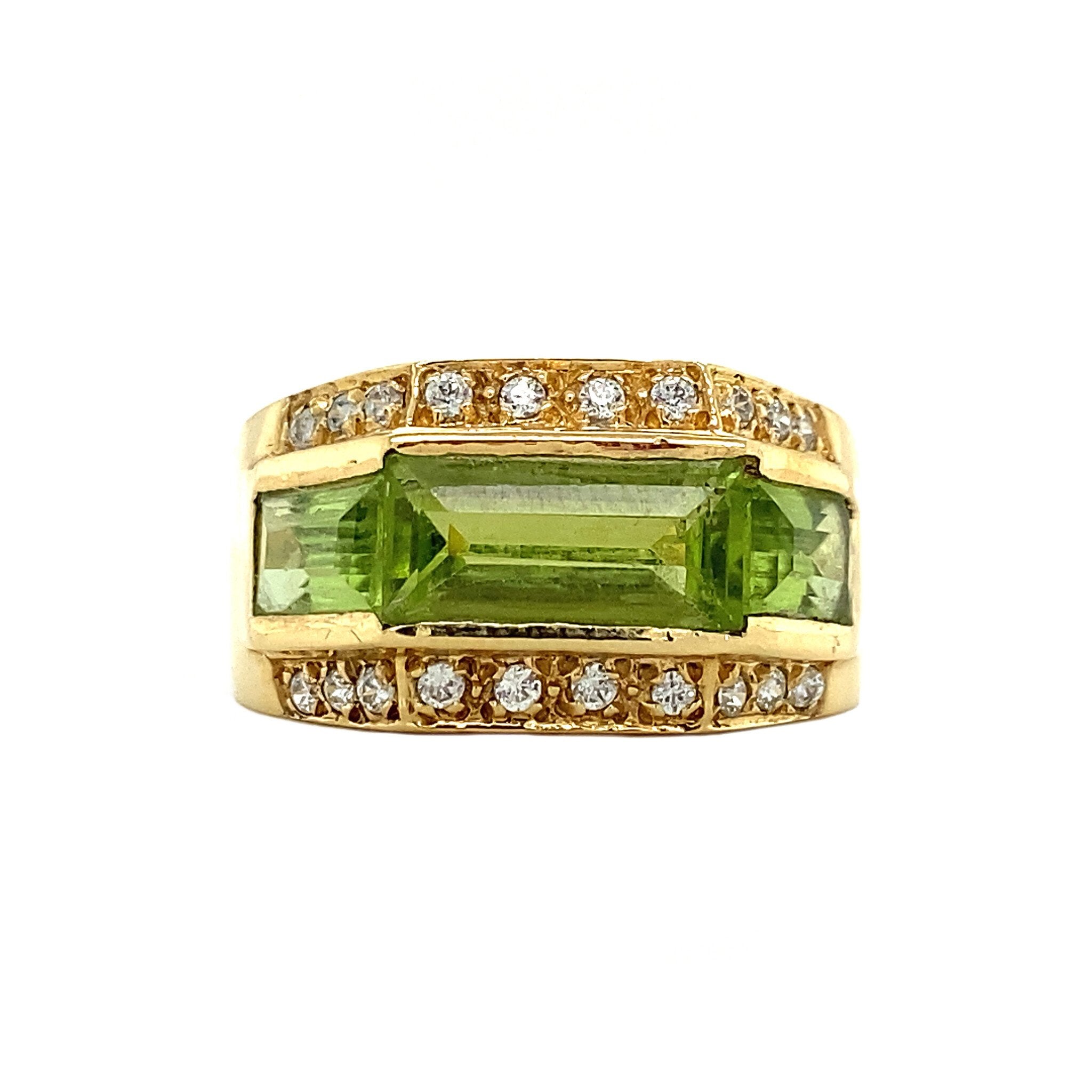 18 kt gold ring with peridot and diamond