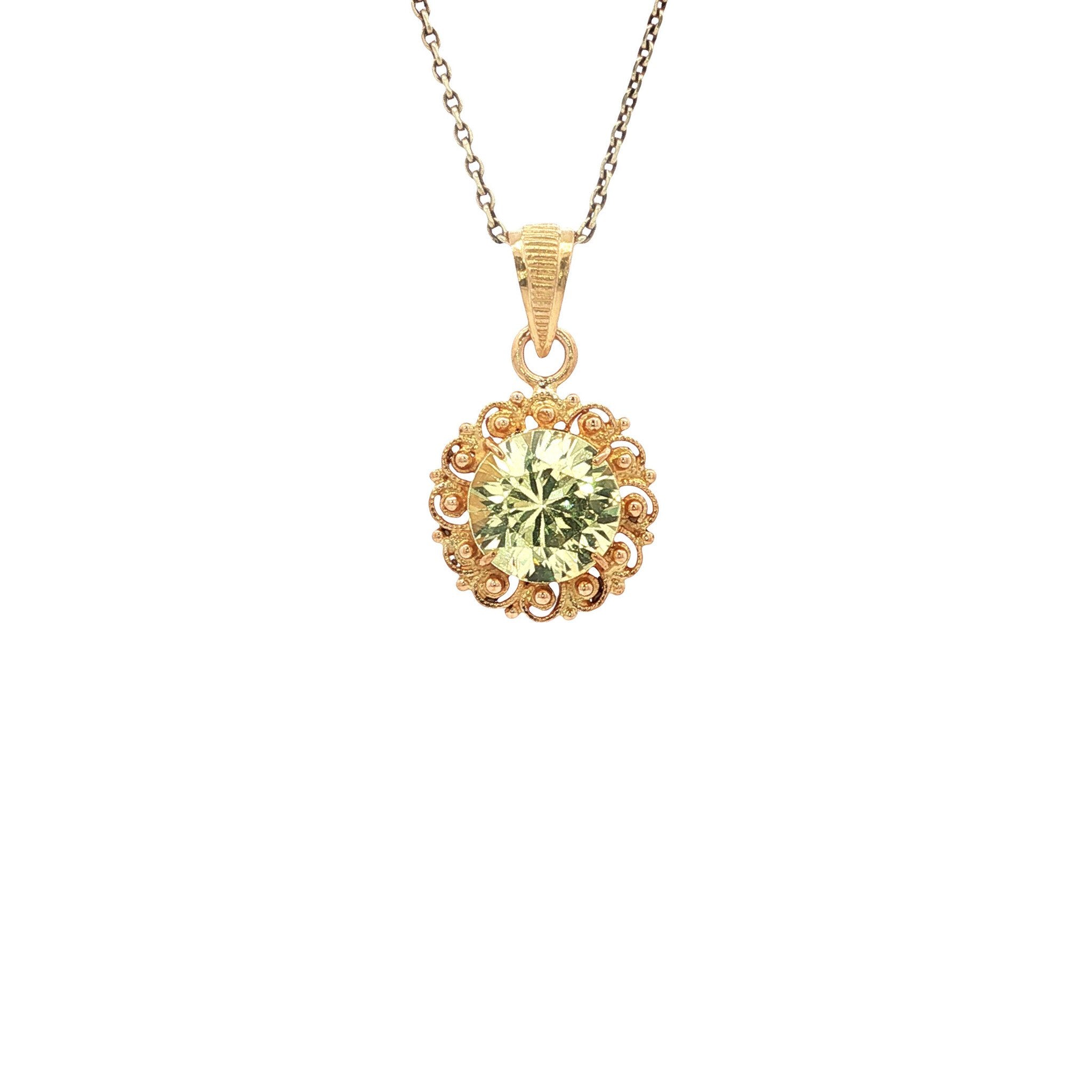 Gouden hanger met saffier 22 kt