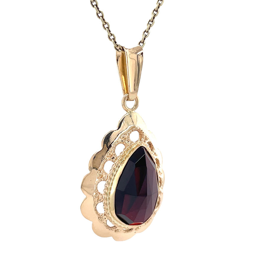 Vintage gold pendant with garnet, 14 kt