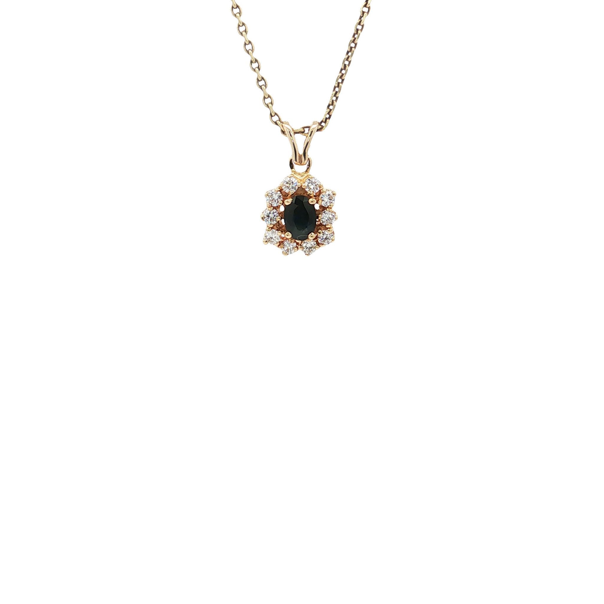 Vintage gold entourage pendant with sapphire and diamond, 14 kt