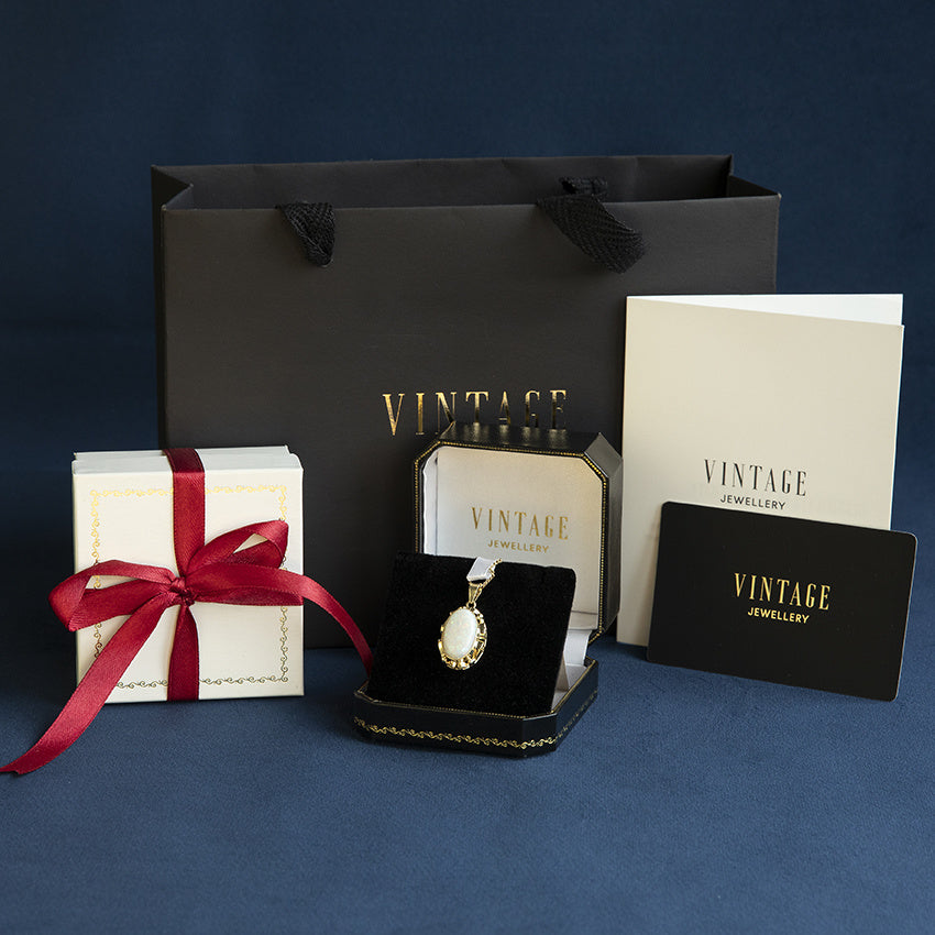 Gouden vintage hanger met parel 14 krt