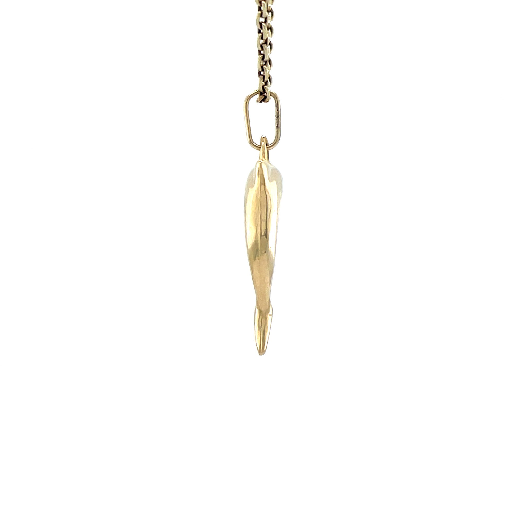 Golden vintage dolphin pendant 14 kt