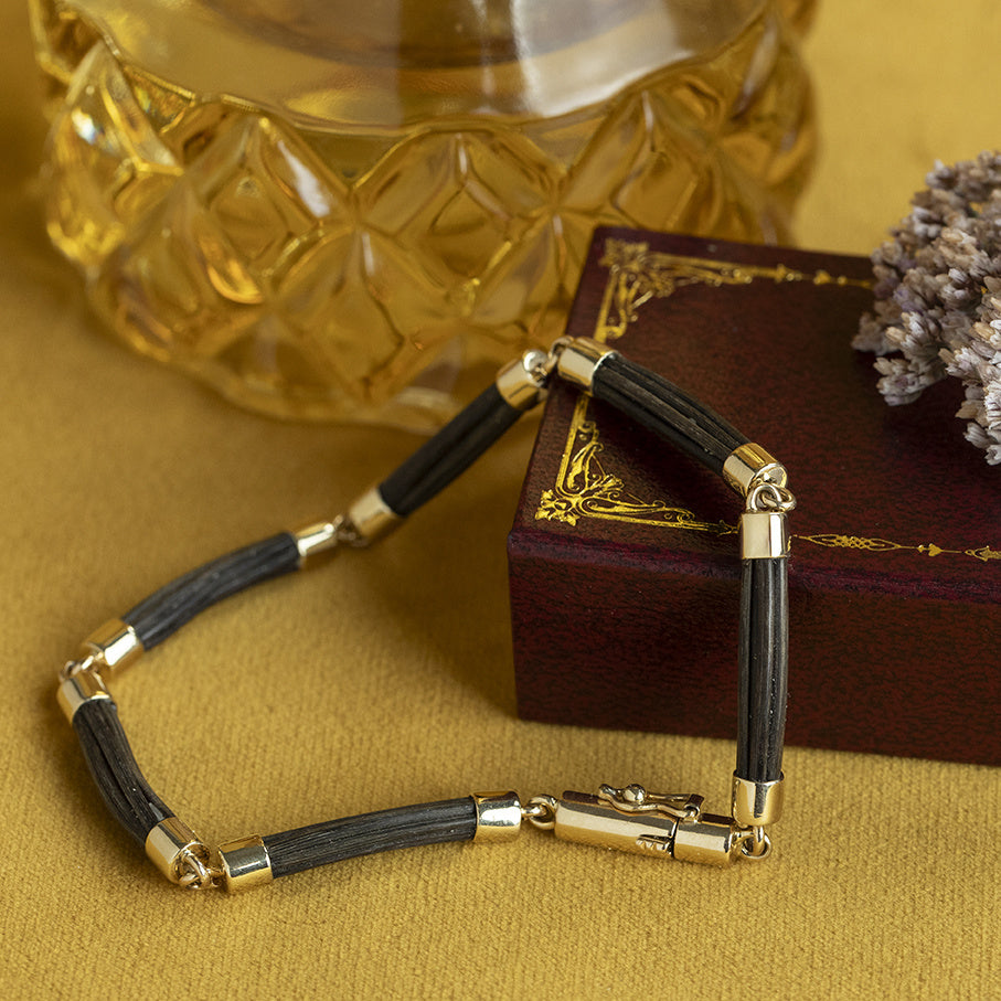 Gouden vintage armband met olifanten haar 14 kt