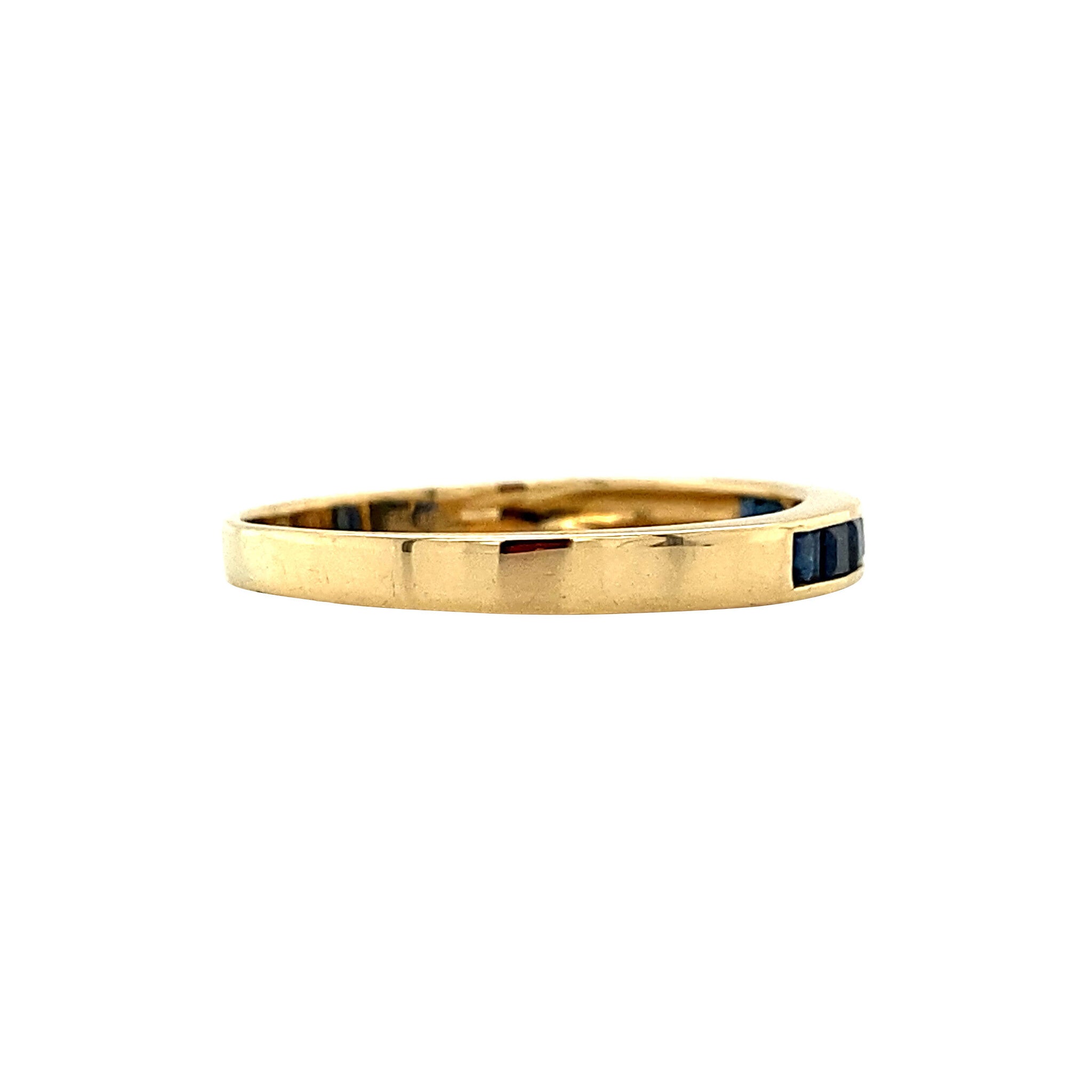 18 kt gold row ring with sapphire