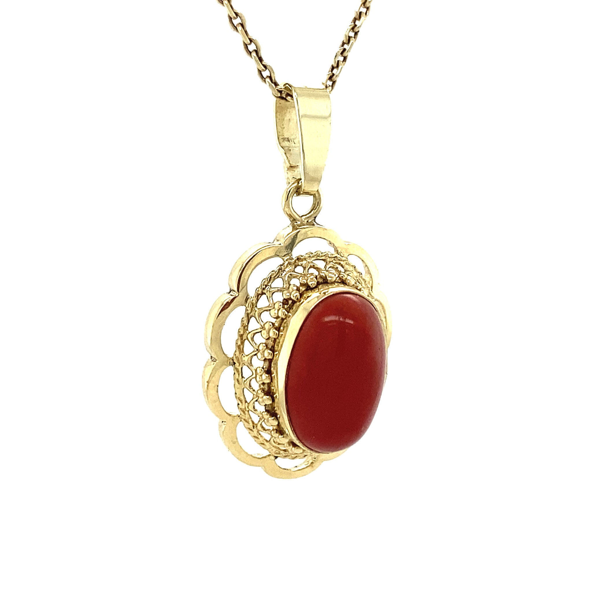 Golden pendant with blood coral 14 kt