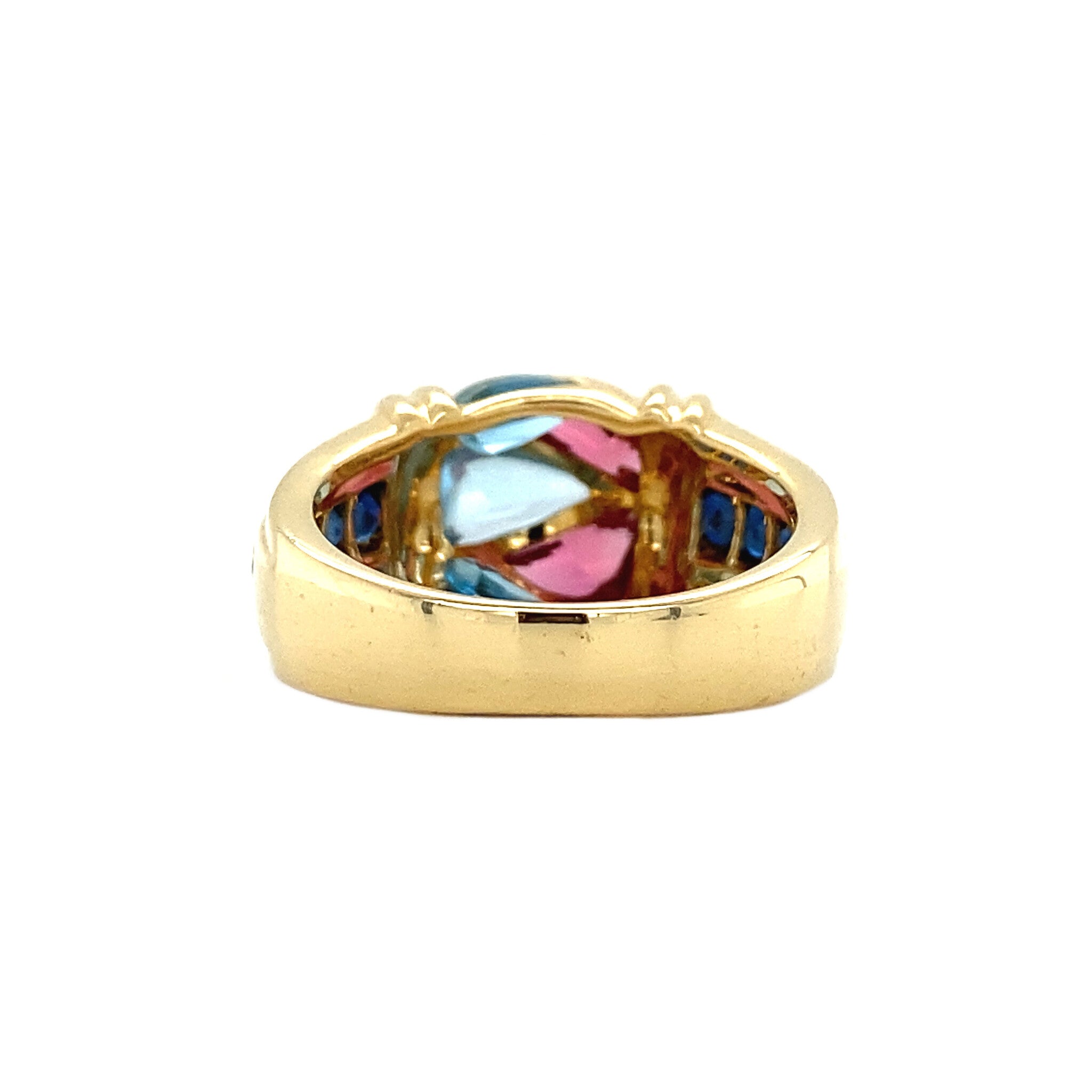 18 kt gold ring with sapphire and pink and blue topaz