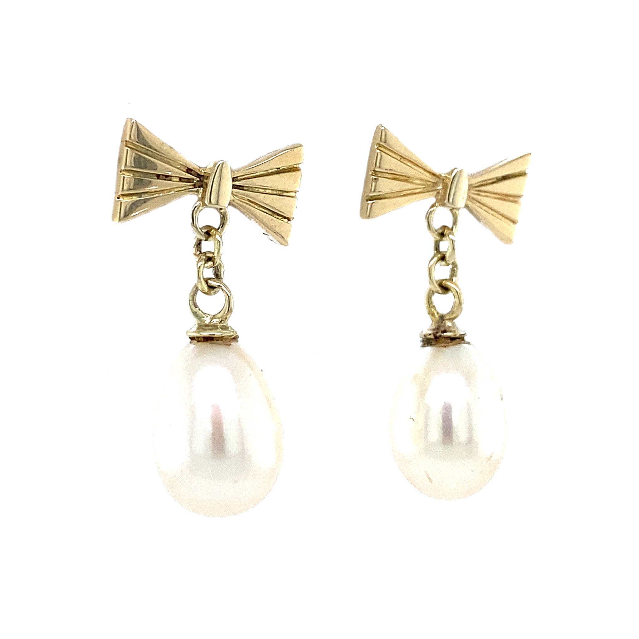 14 kt gold bow stud earrings with pearl