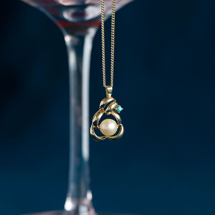 Gouden hanger met parel en turkoois 14 krt