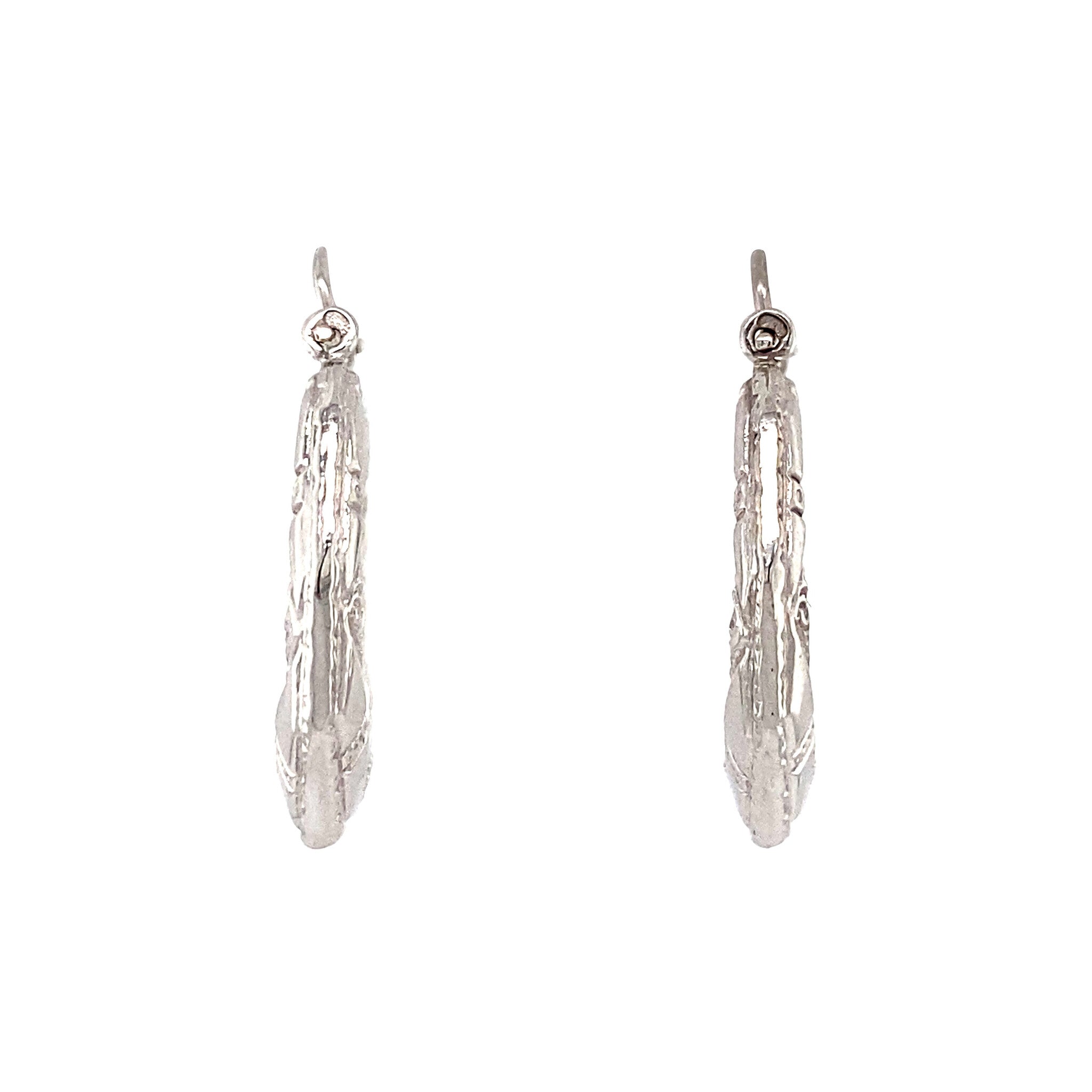 14 kt white gold fancy earrings