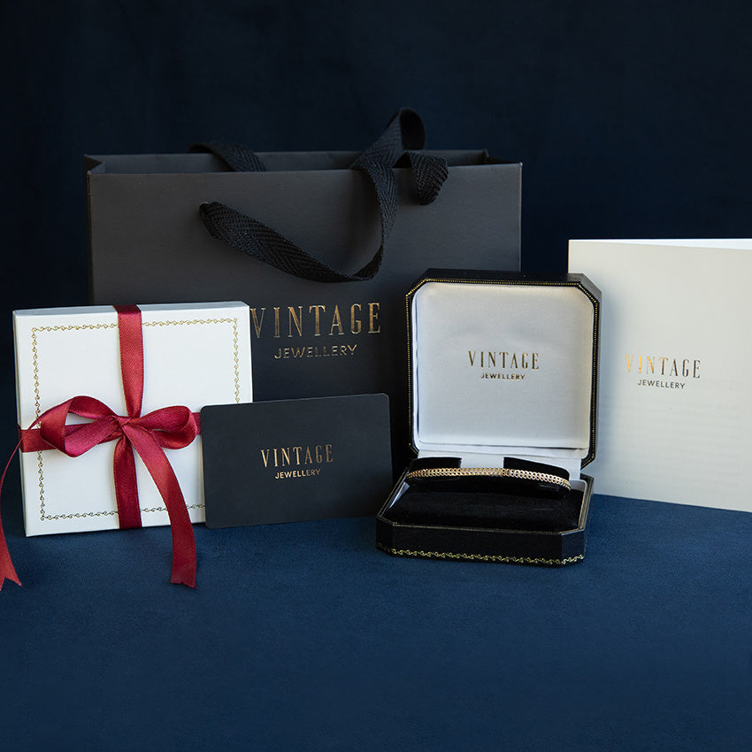 Gouden dubbele gourmet armband 14 krt