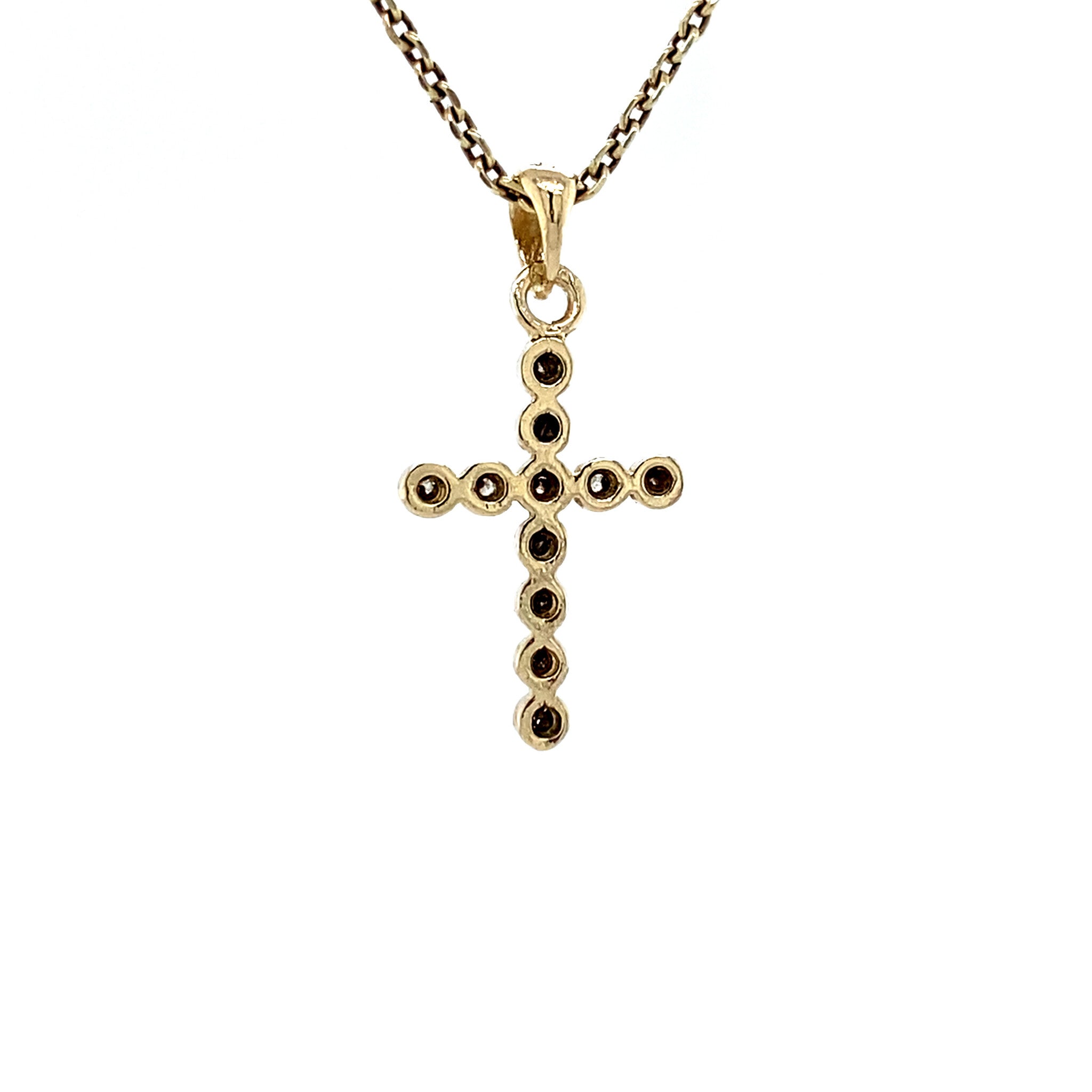 14 kt gold cross pendant with diamond
