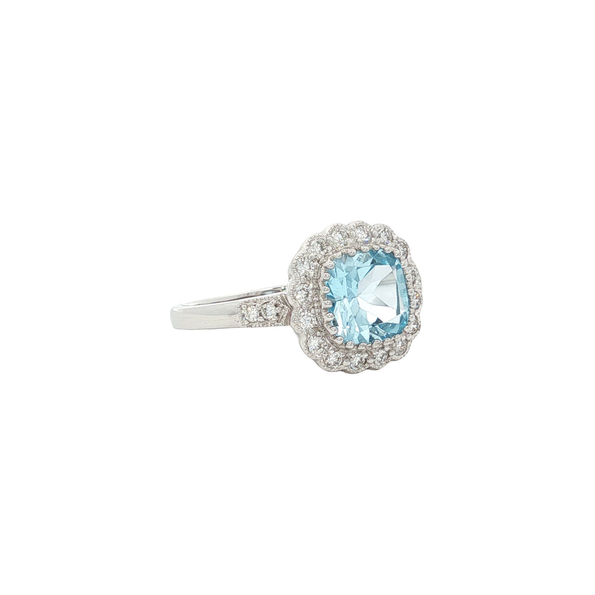Gouden ring met blauwe topaas en diamant 14 kt