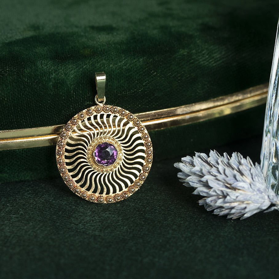 Vintage gold pendant with a colored stone, 14 kt