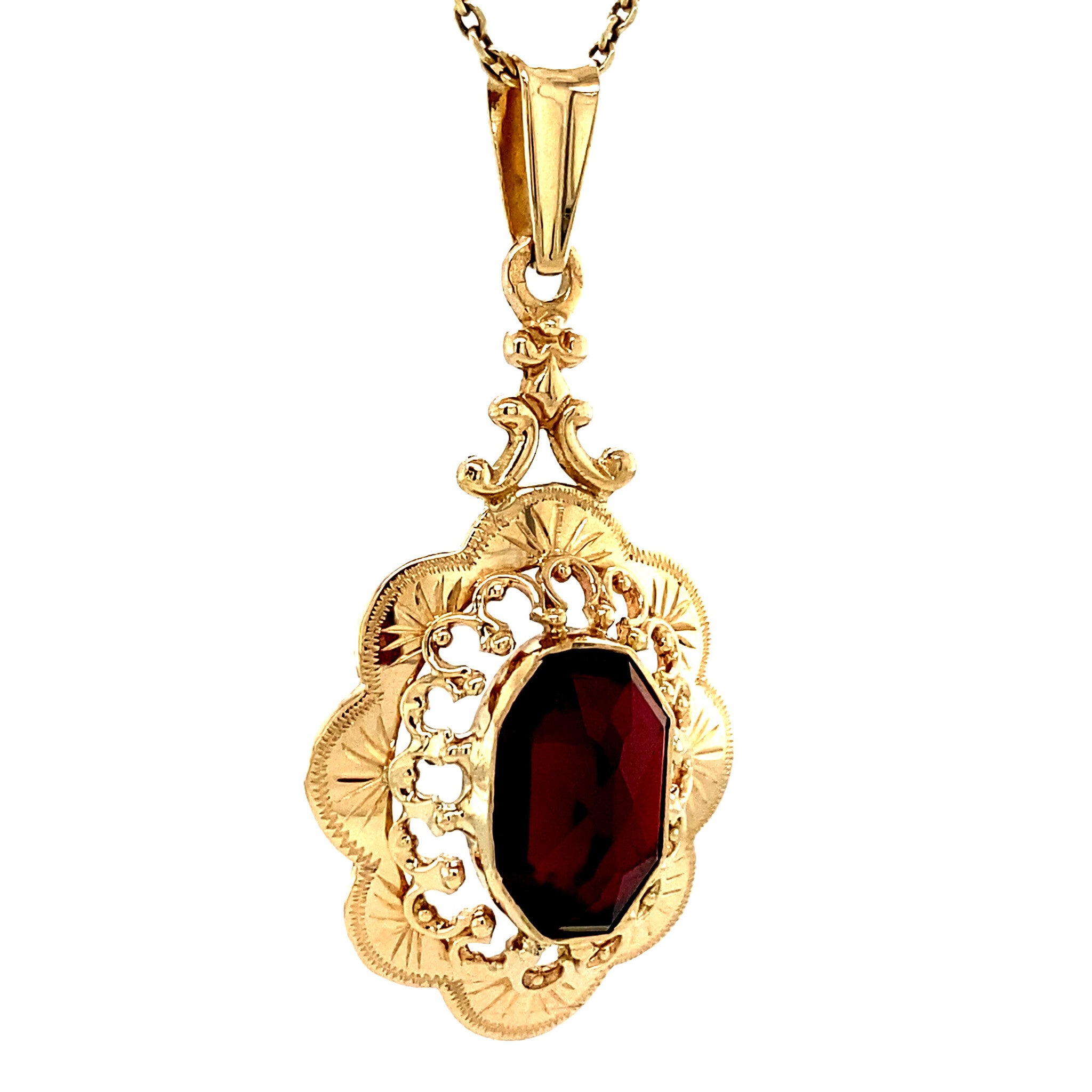 Gold pendant with garnet 14 kt