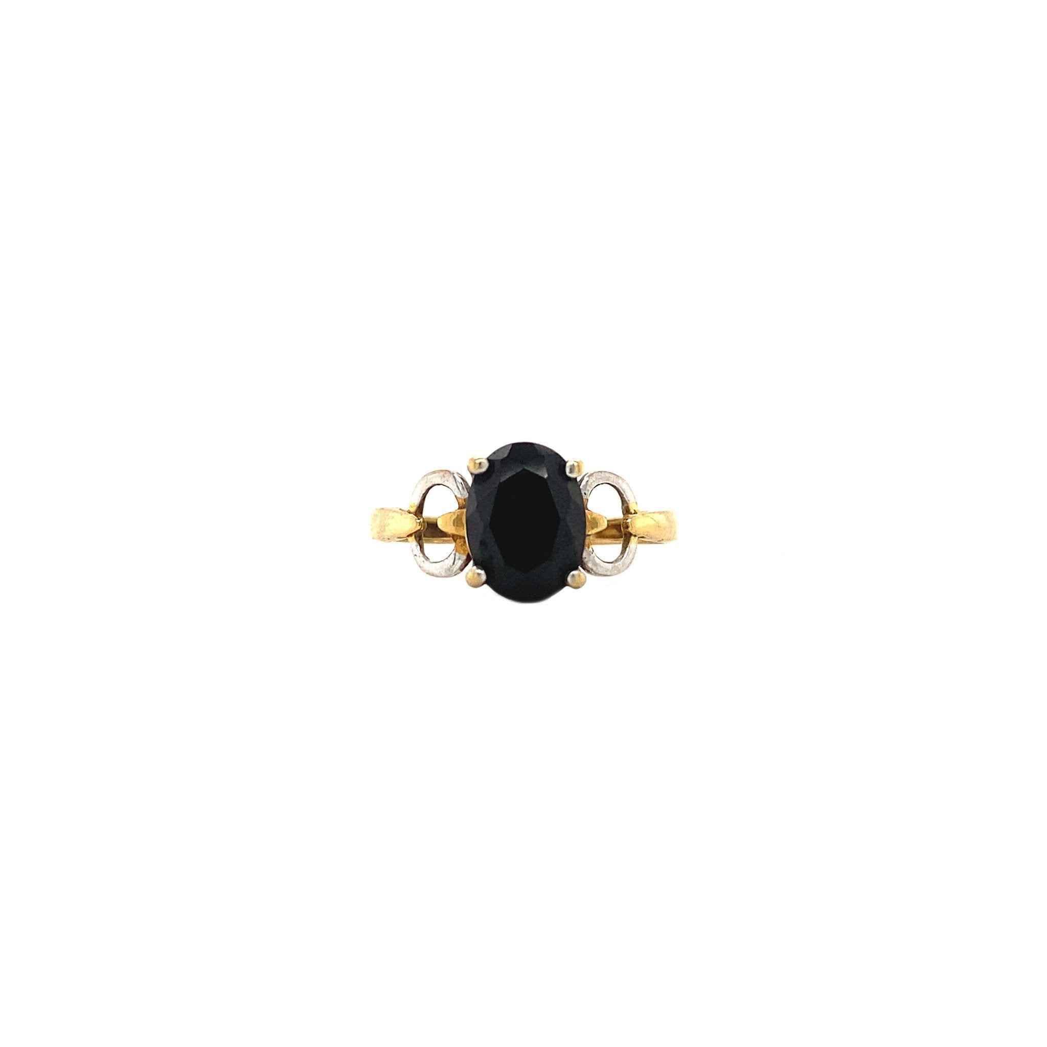 18 kt gold ring with zirconia