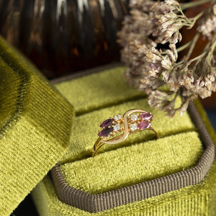 Gouden vintage slagring met robijn en zirkonia 18 kt