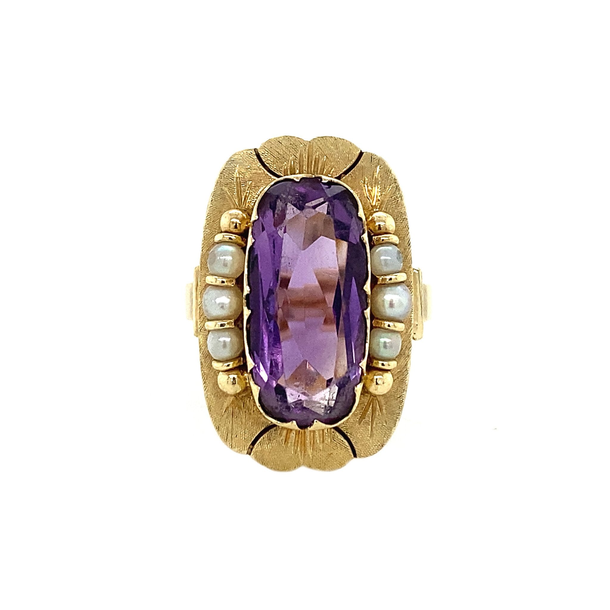 14 kt gold ring with amethyst and pearl.