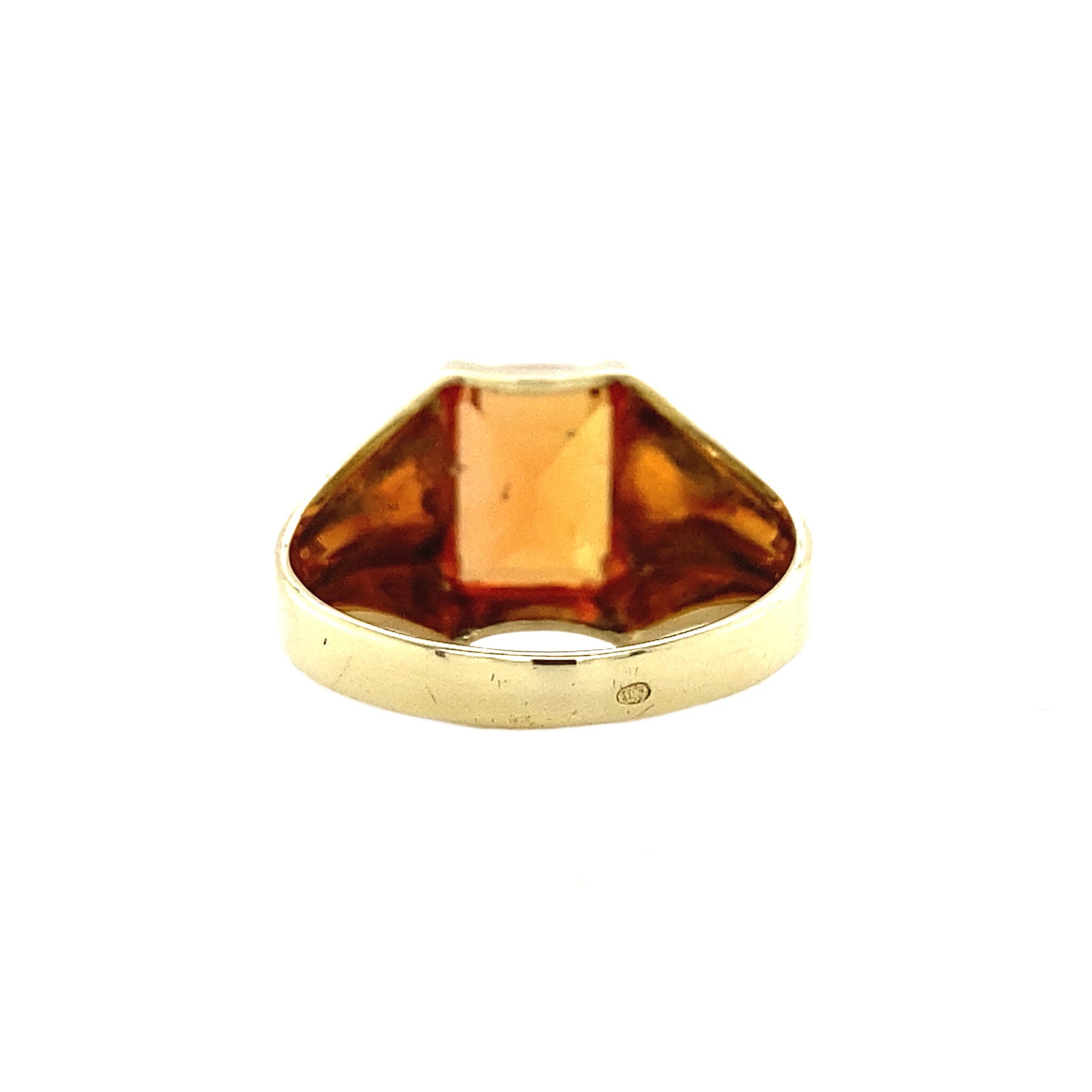 14 kt gold pinky ring with an orange sapphire