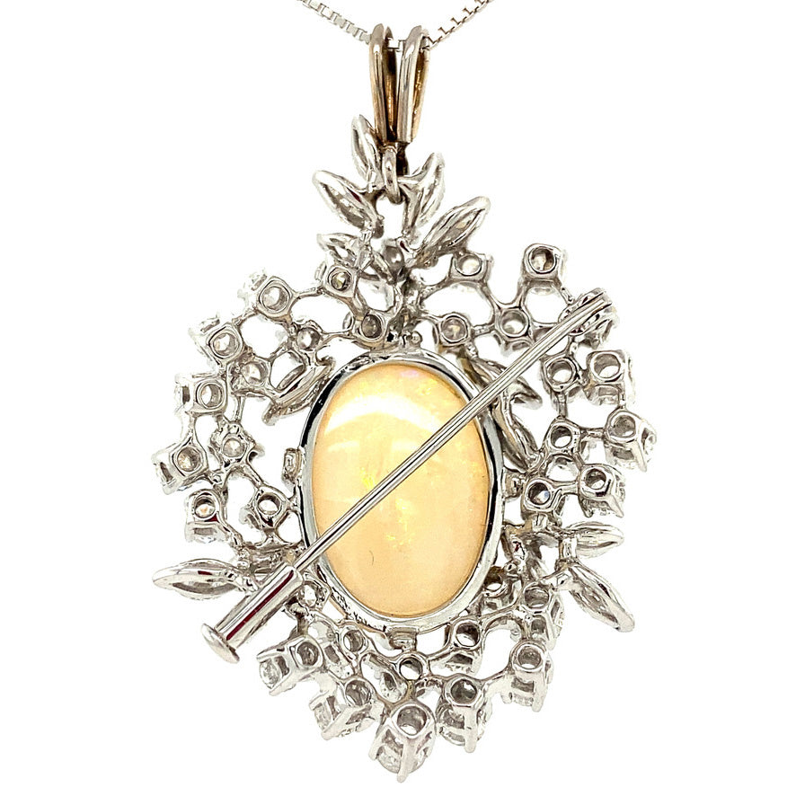 Witgouden hanger met opaal en diamant 14 krt