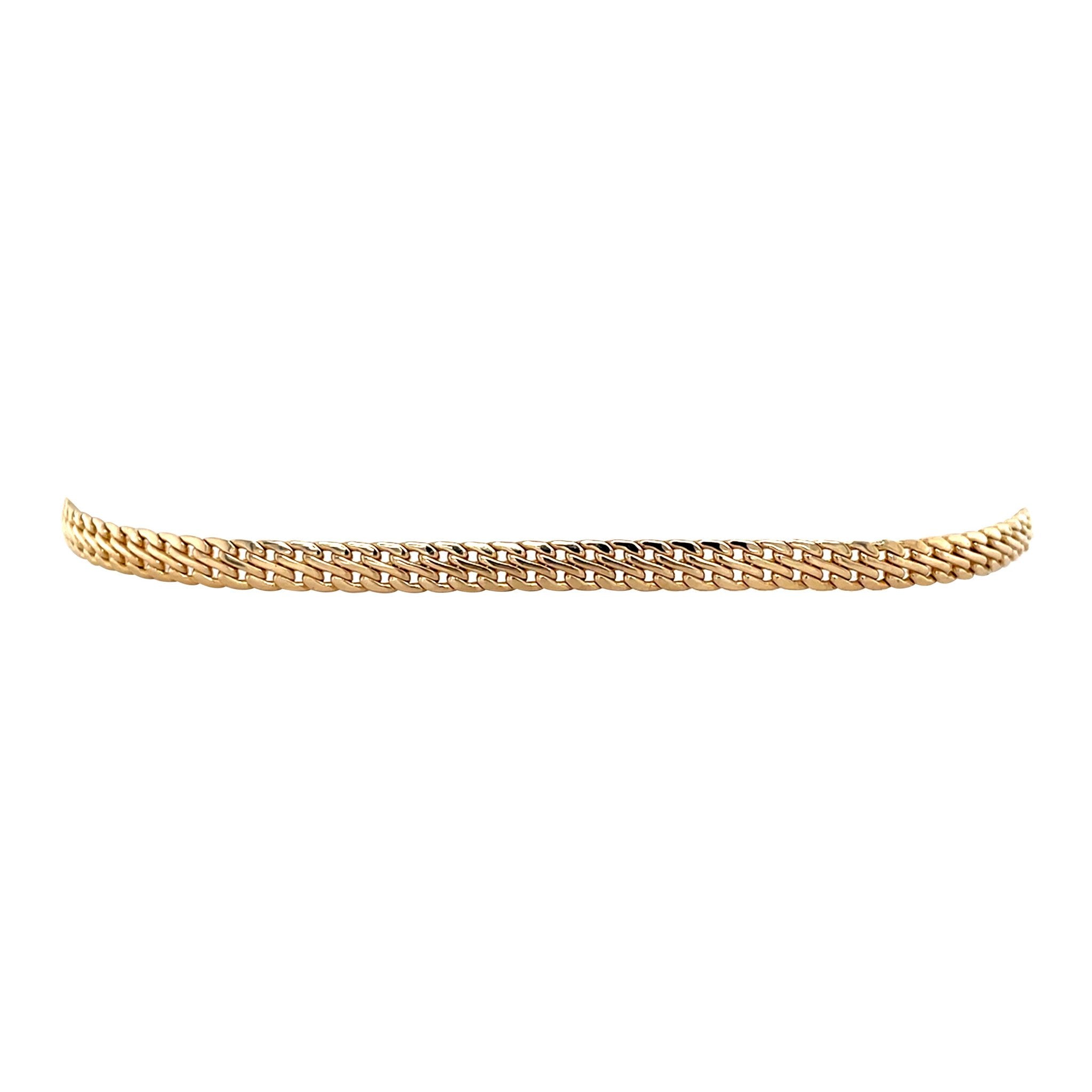 Gold double curb bracelet 14 krt