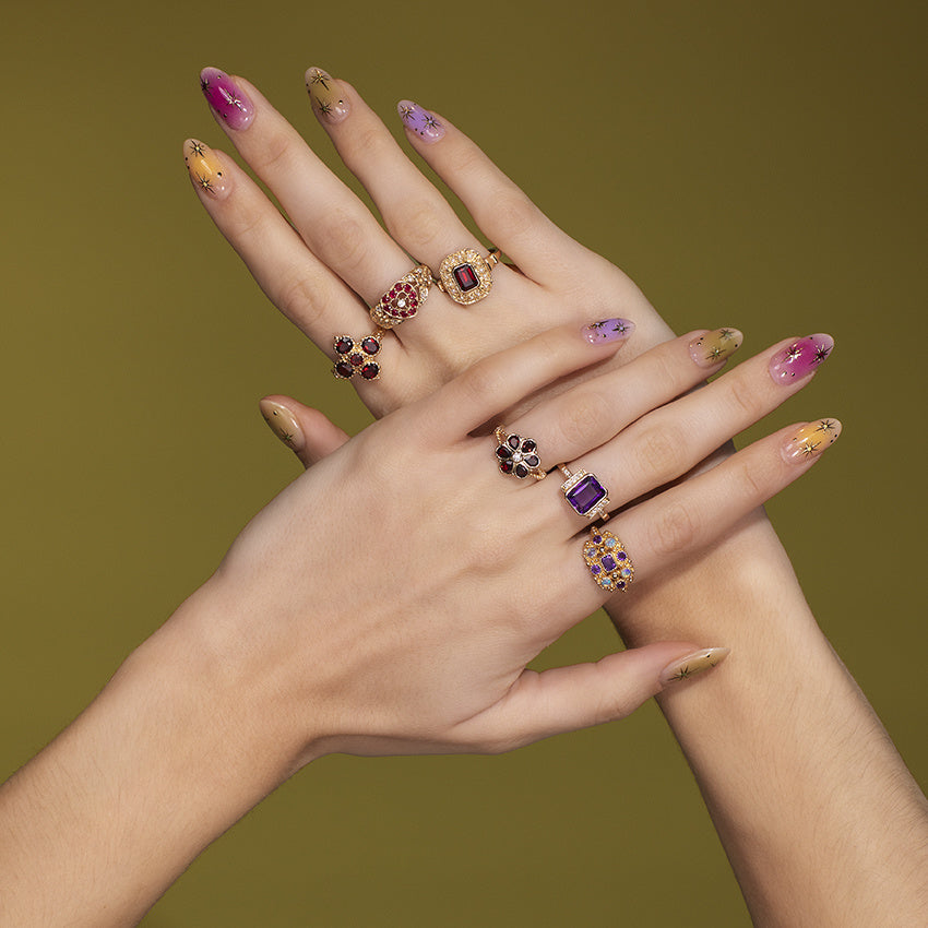 Gold ring with diamond and garnet 14 kt