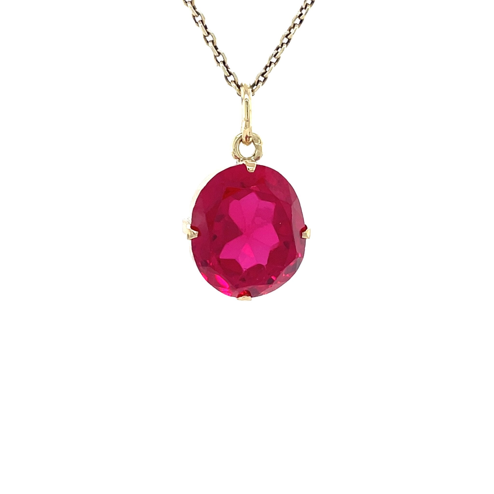 Vintage gold pendant with a ruby, 14 kt