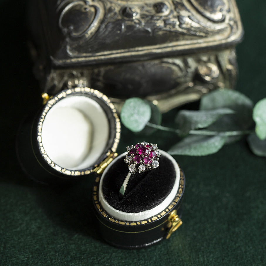White gold ring with ruby and diamond 14 kt
