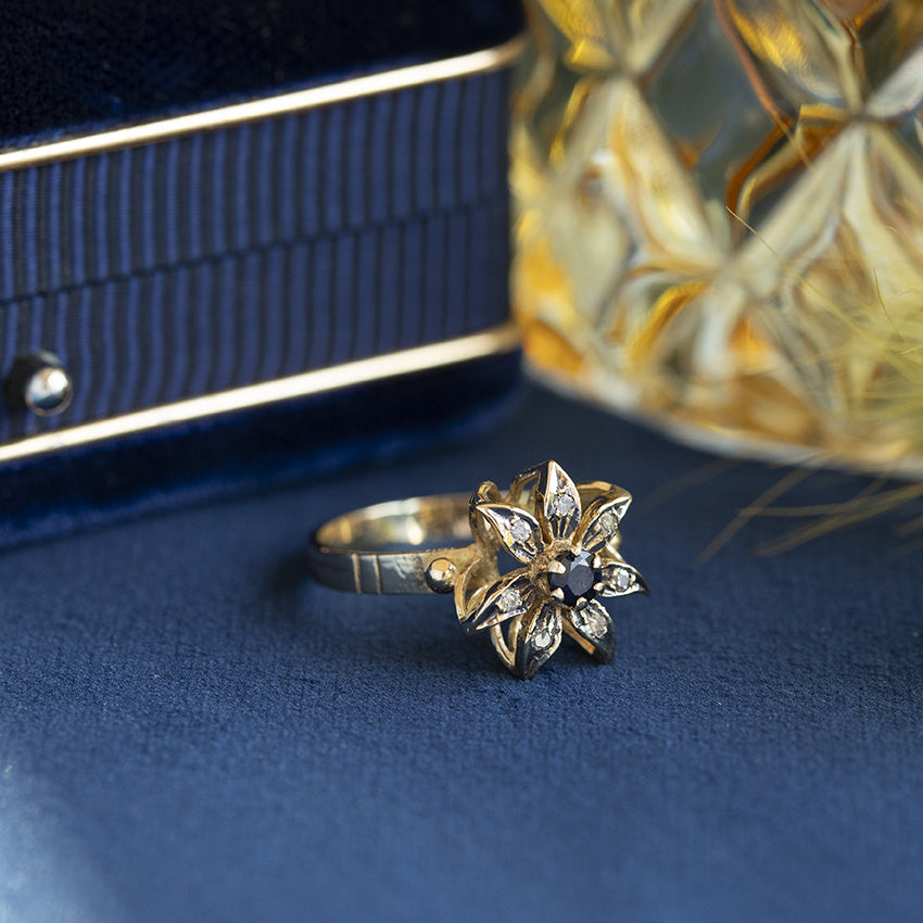 14 kt gold vintage entourage ring with sapphire and diamond