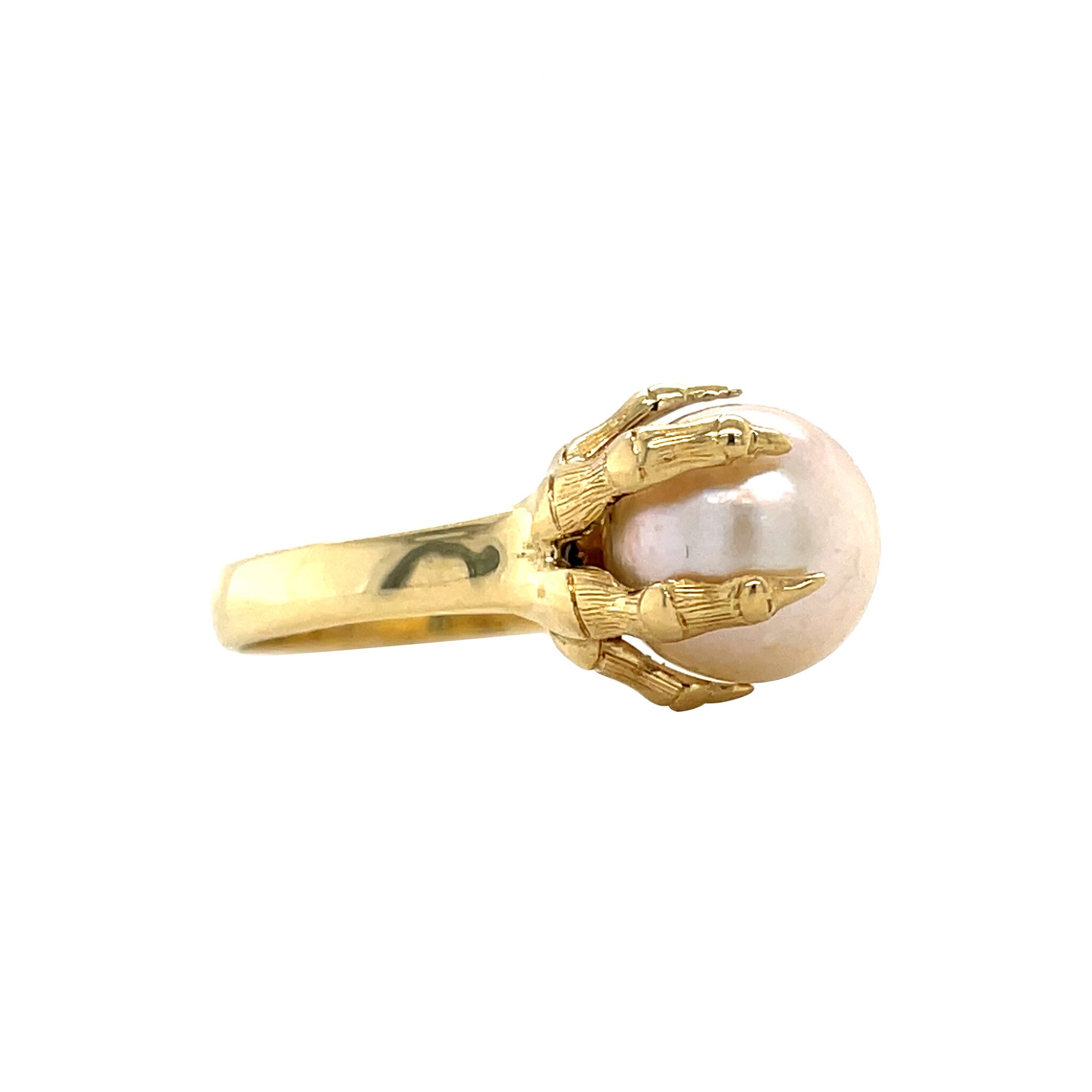 Gouden vintage klauw ring met parel 18 krt