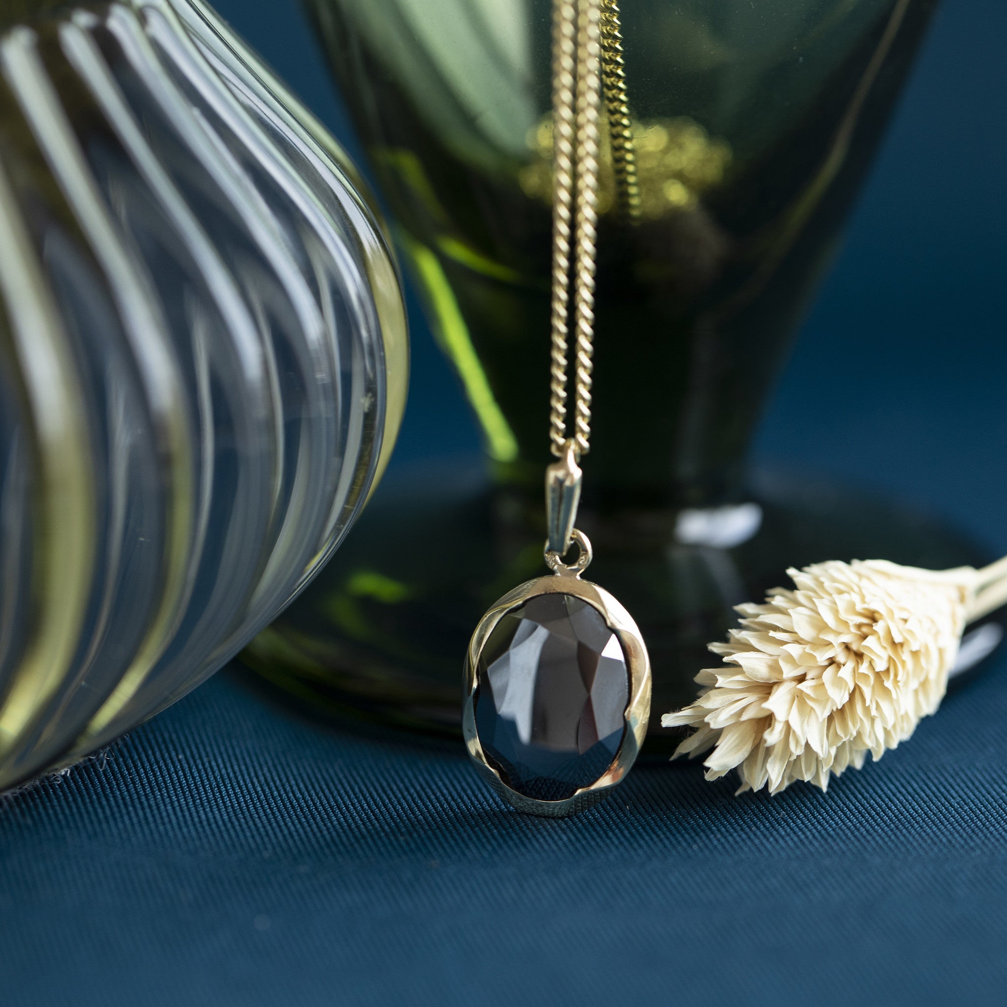 Gouden hanger met hematiet 14 krt