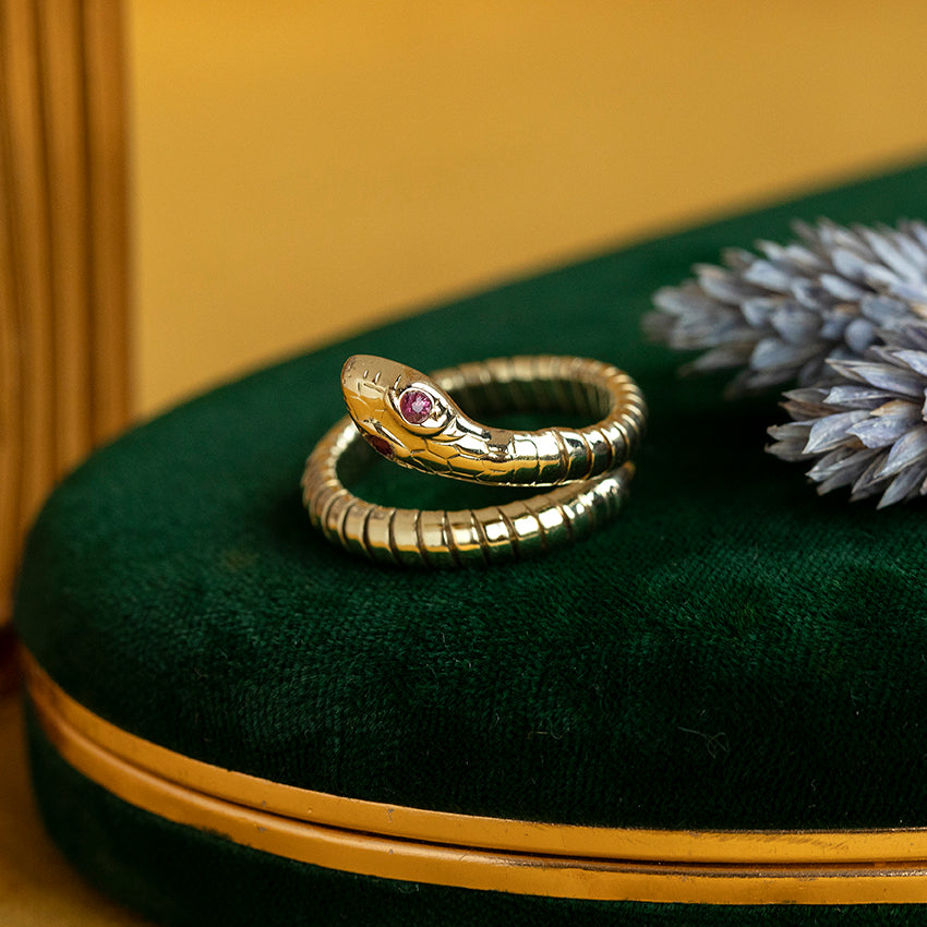 Gouden slangen ring met kleursteen 14 kt