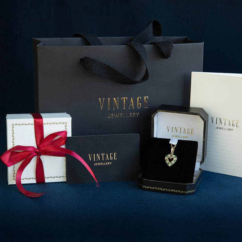 Witgouden vintage hanger met saffier en diamant 14 kt