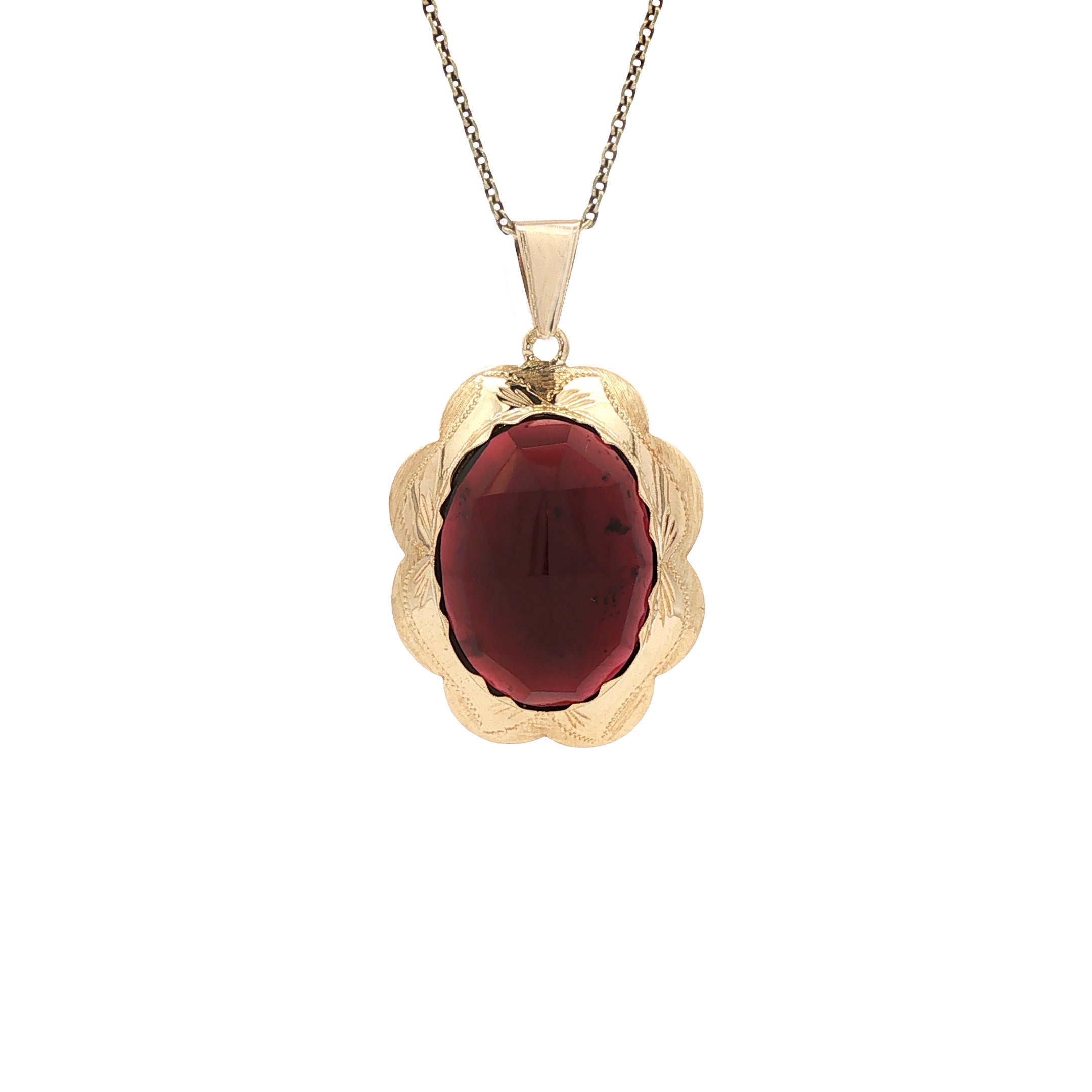 Vintage 14 kt gold pendant with garnet