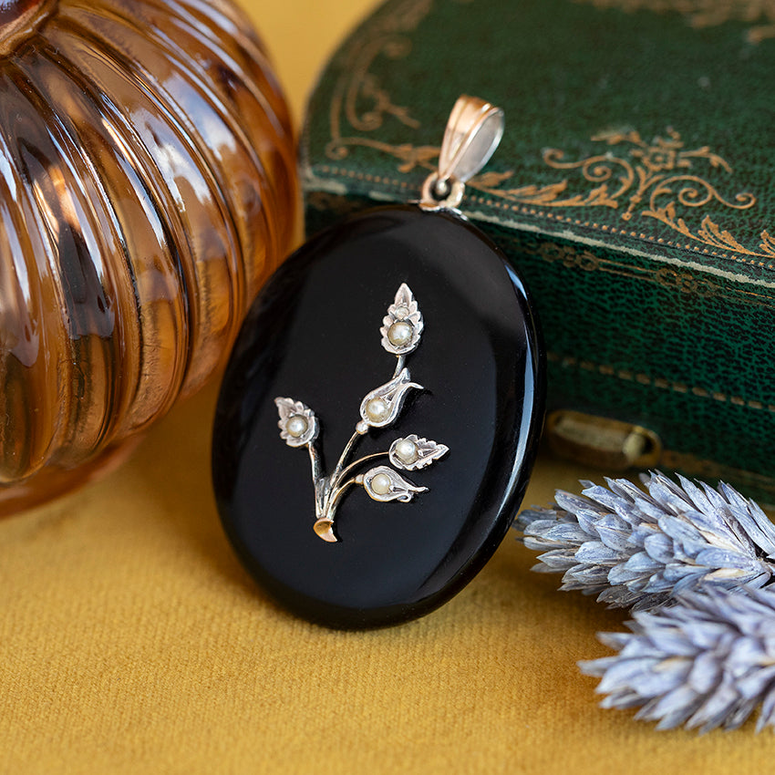 Hanger met onyx en parel 9 kt