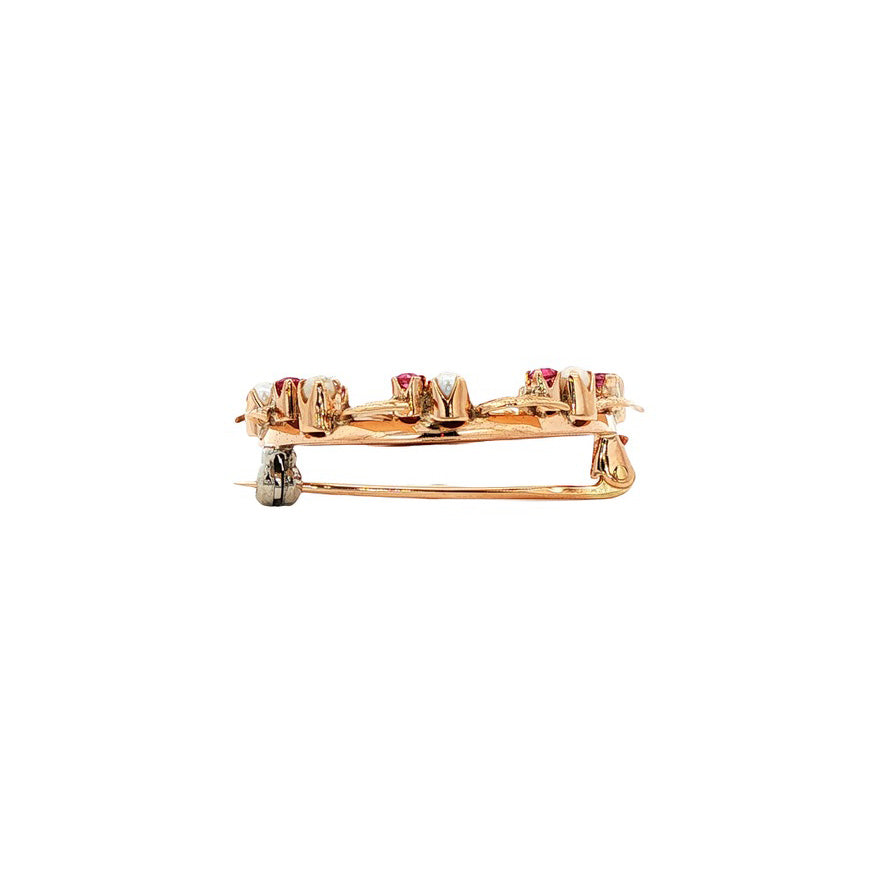 Vintage brooch with ruby and pearl 12 kt