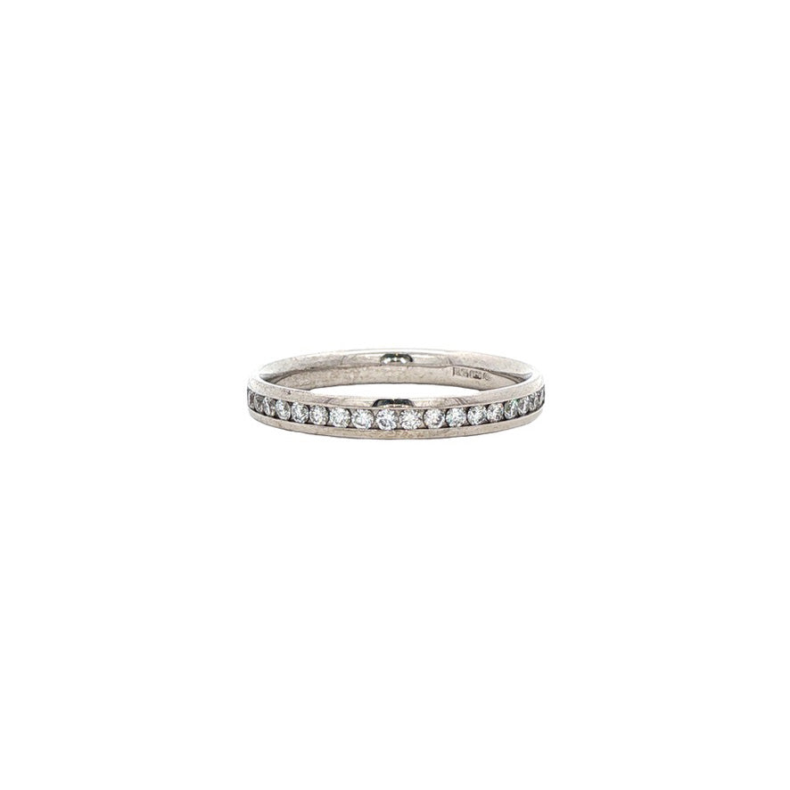 18 kt white gold vintage alliance ring with a diamond