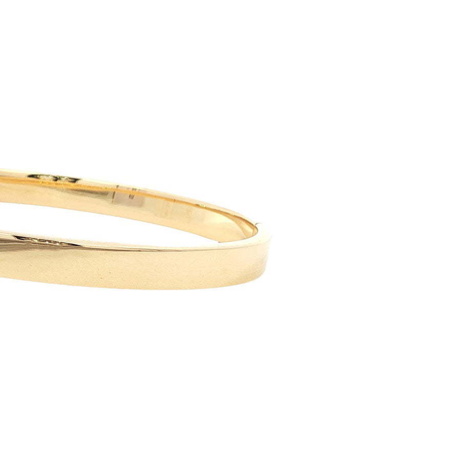 Smooth 14 kt gold bangle