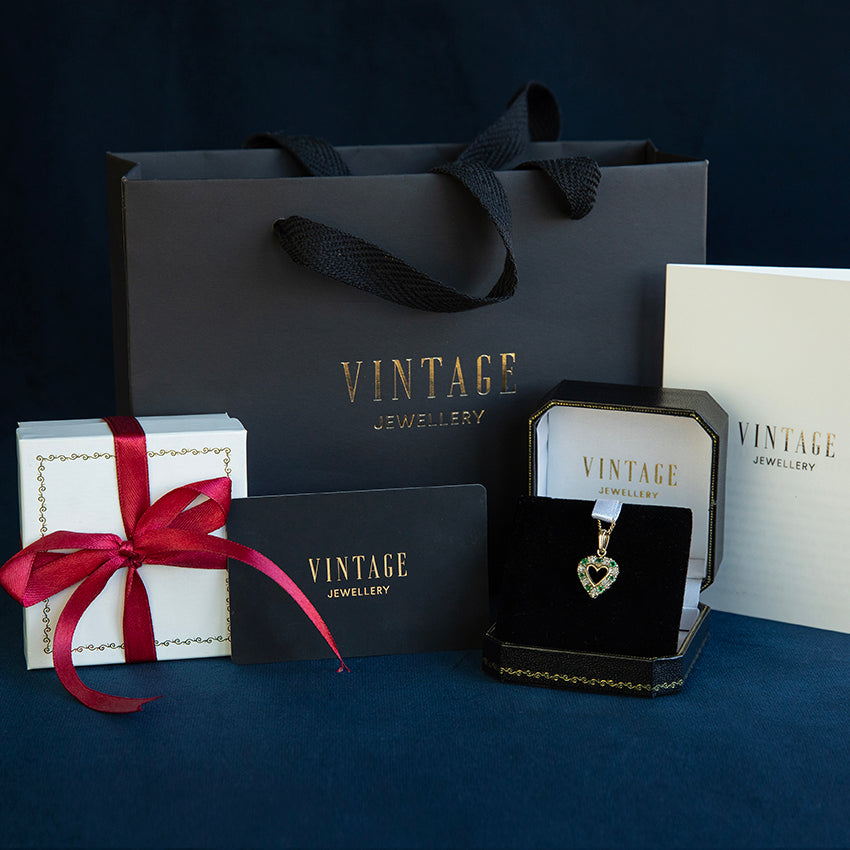 Witgouden vintage hanger met smaragd en diamant 14 kt