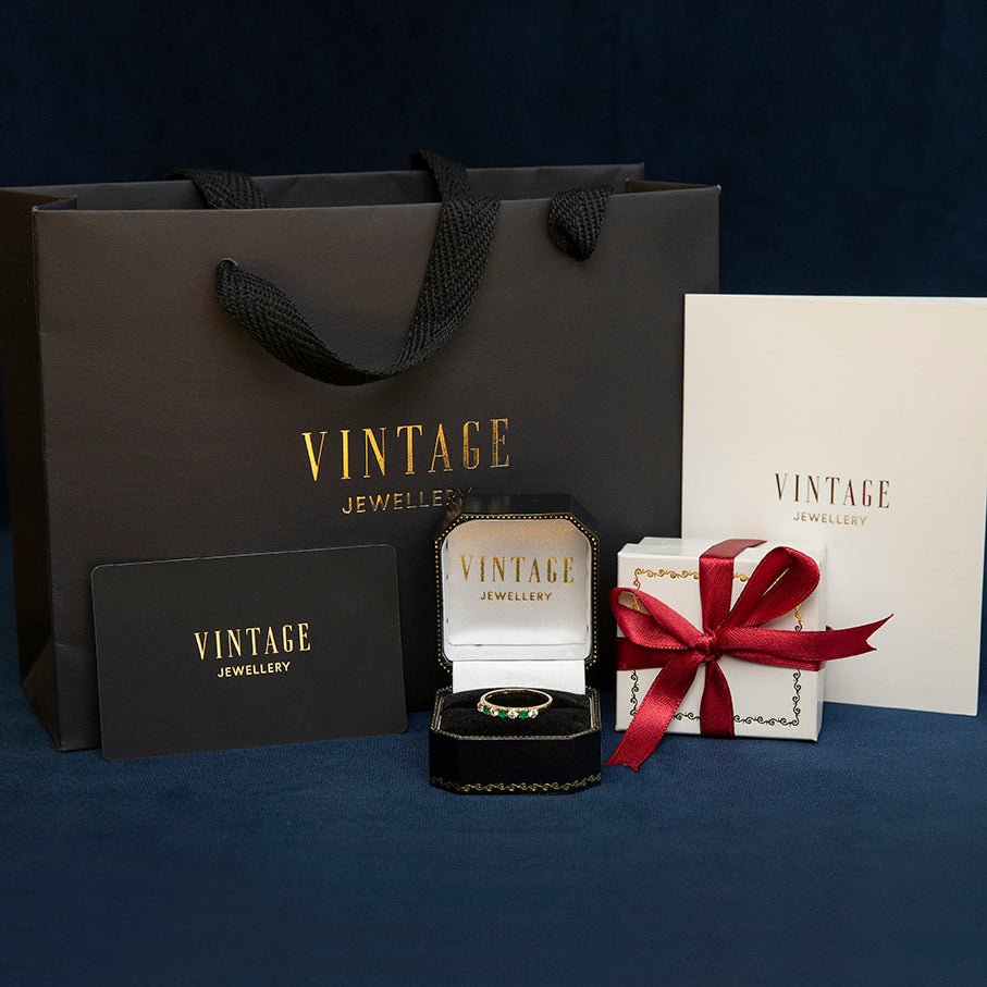 Witgouden vintage ring met smaragd en diamant 14 kt