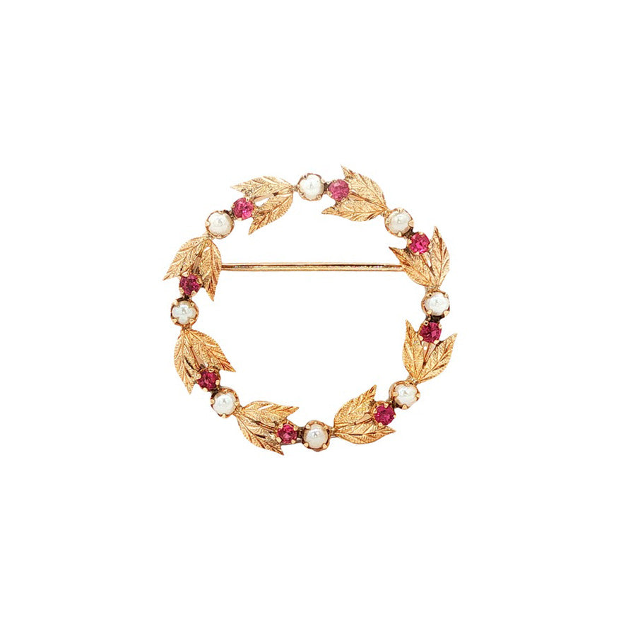 Vintage brooch with ruby and pearl 12 kt