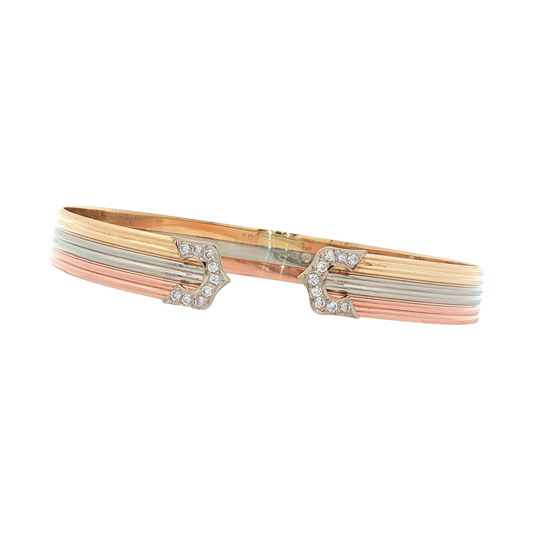 14 kt tricolour vintage gold bangle with diamond