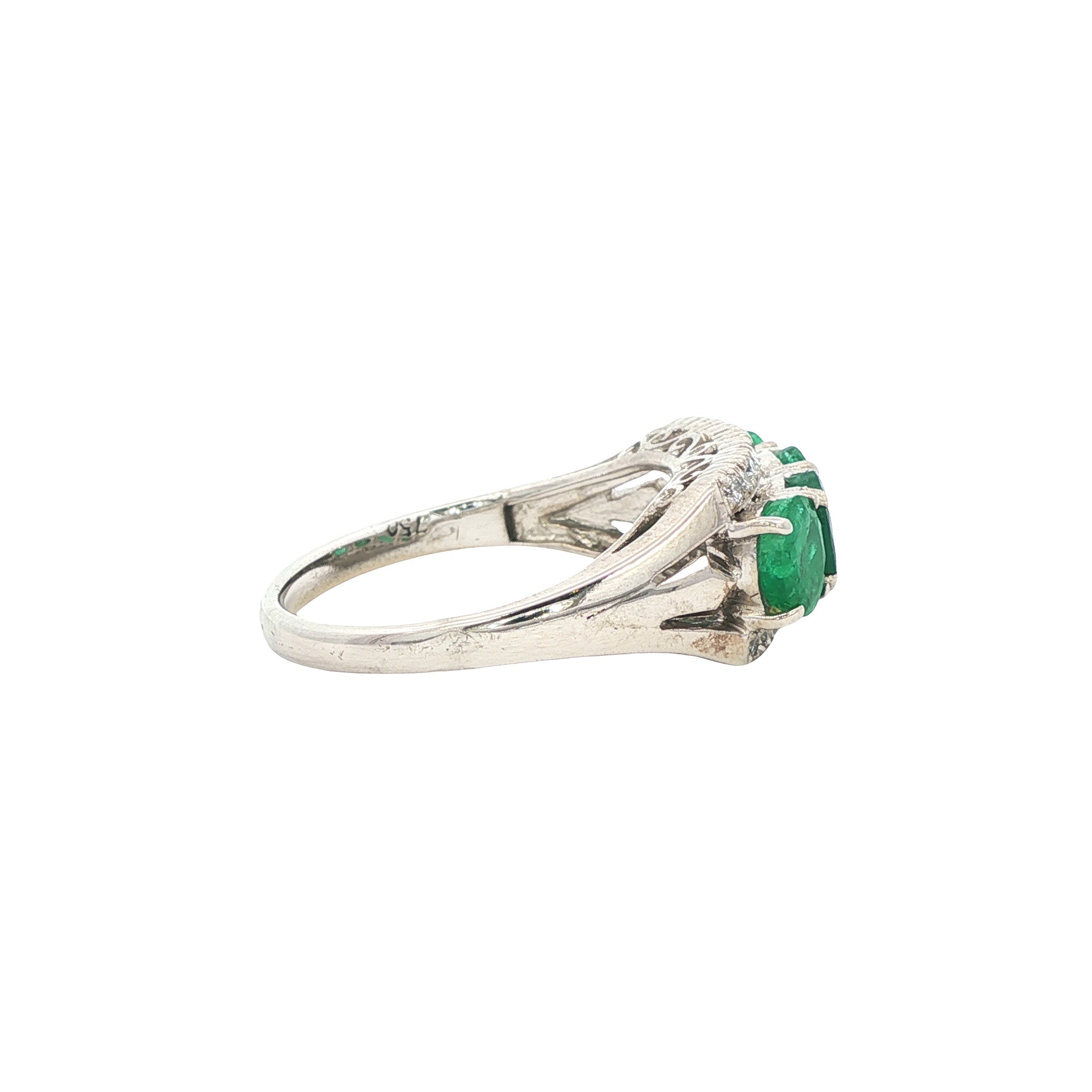 White gold ring with emerald and diamond 14 kt