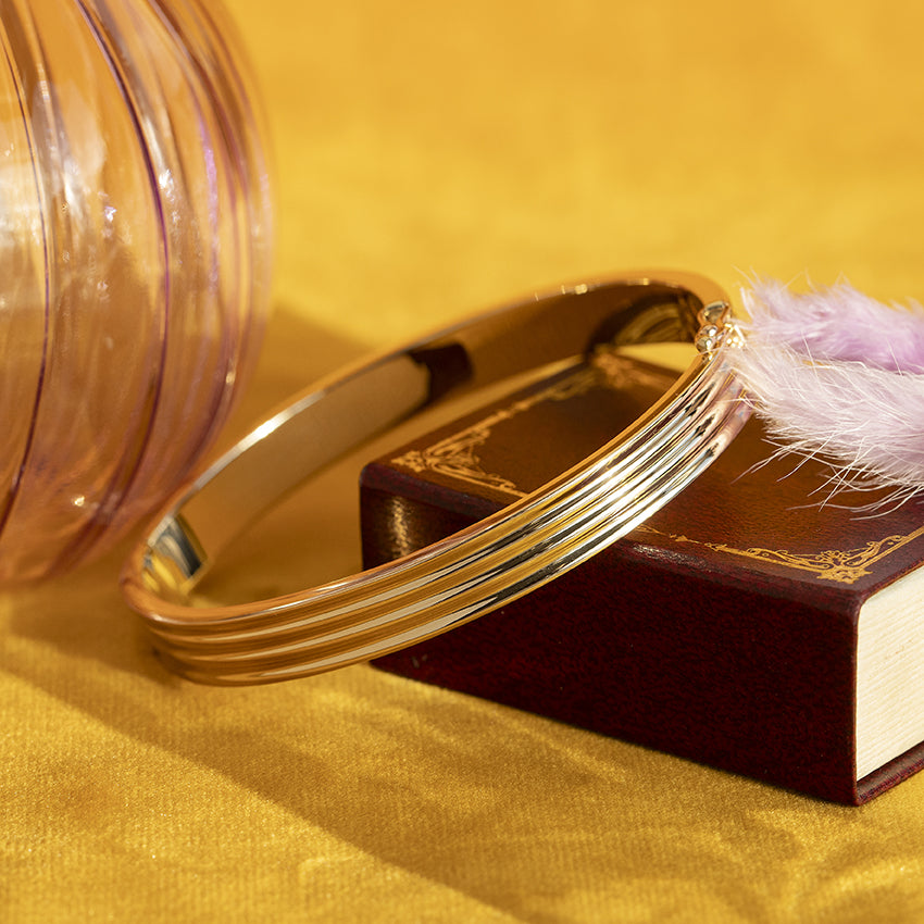 Gouden fantasie bangle 14 kt