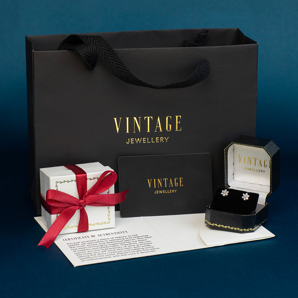 Gouden oorstekers met labradoriet 14 kt