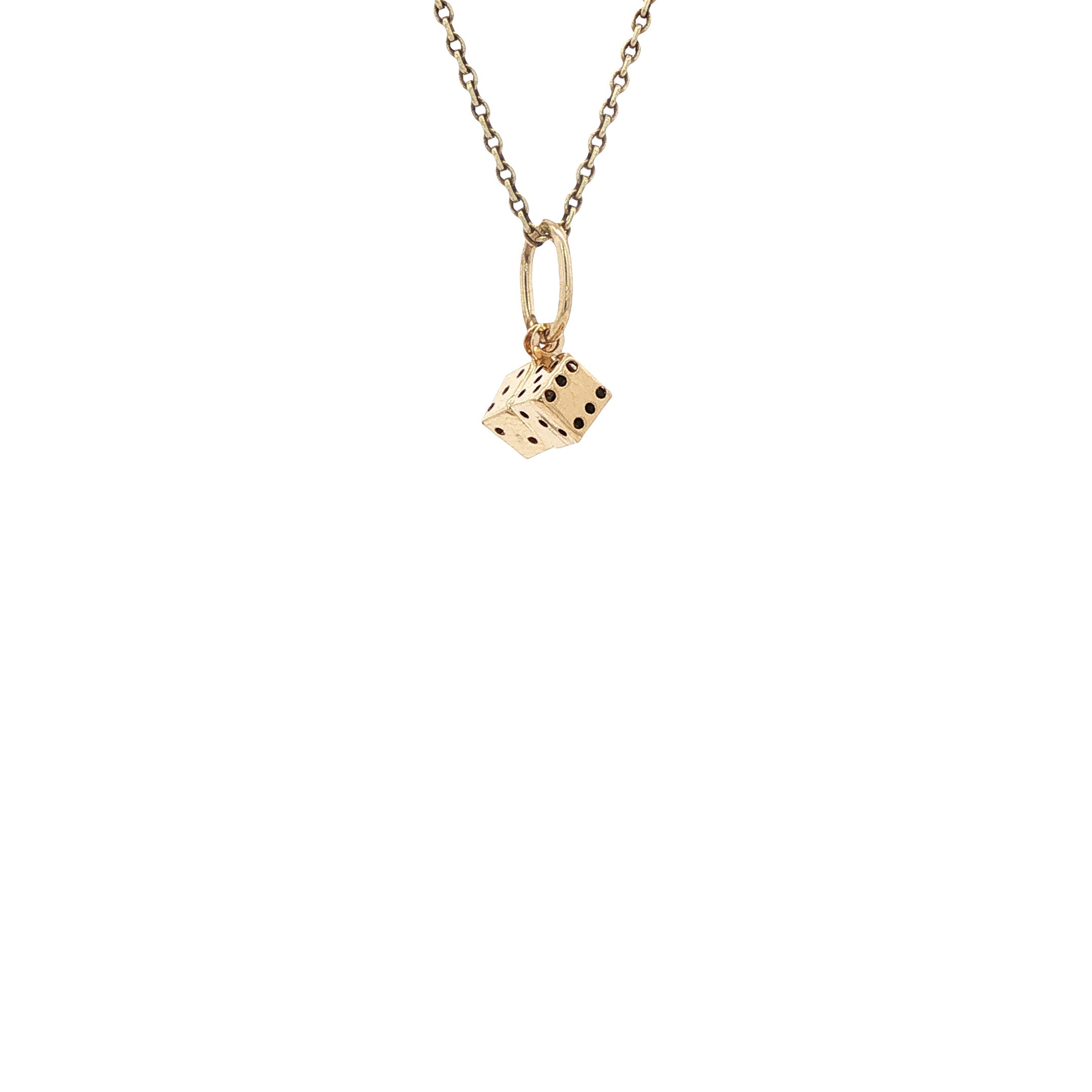 Vintage die pendant 10 kt